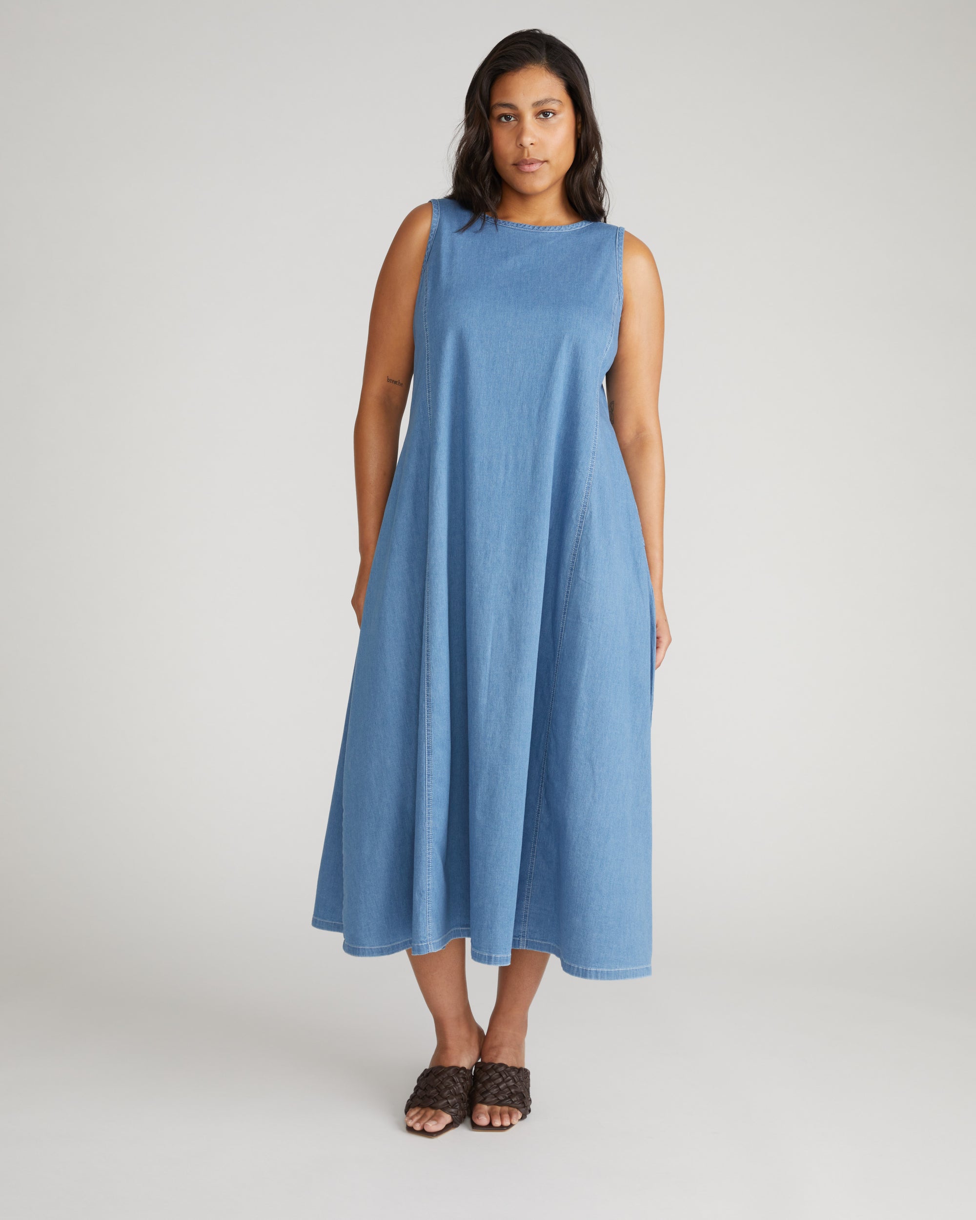 Woman wearing Kendra Cotton Chambray Tank Dress - Cove Blue from Universal Standard