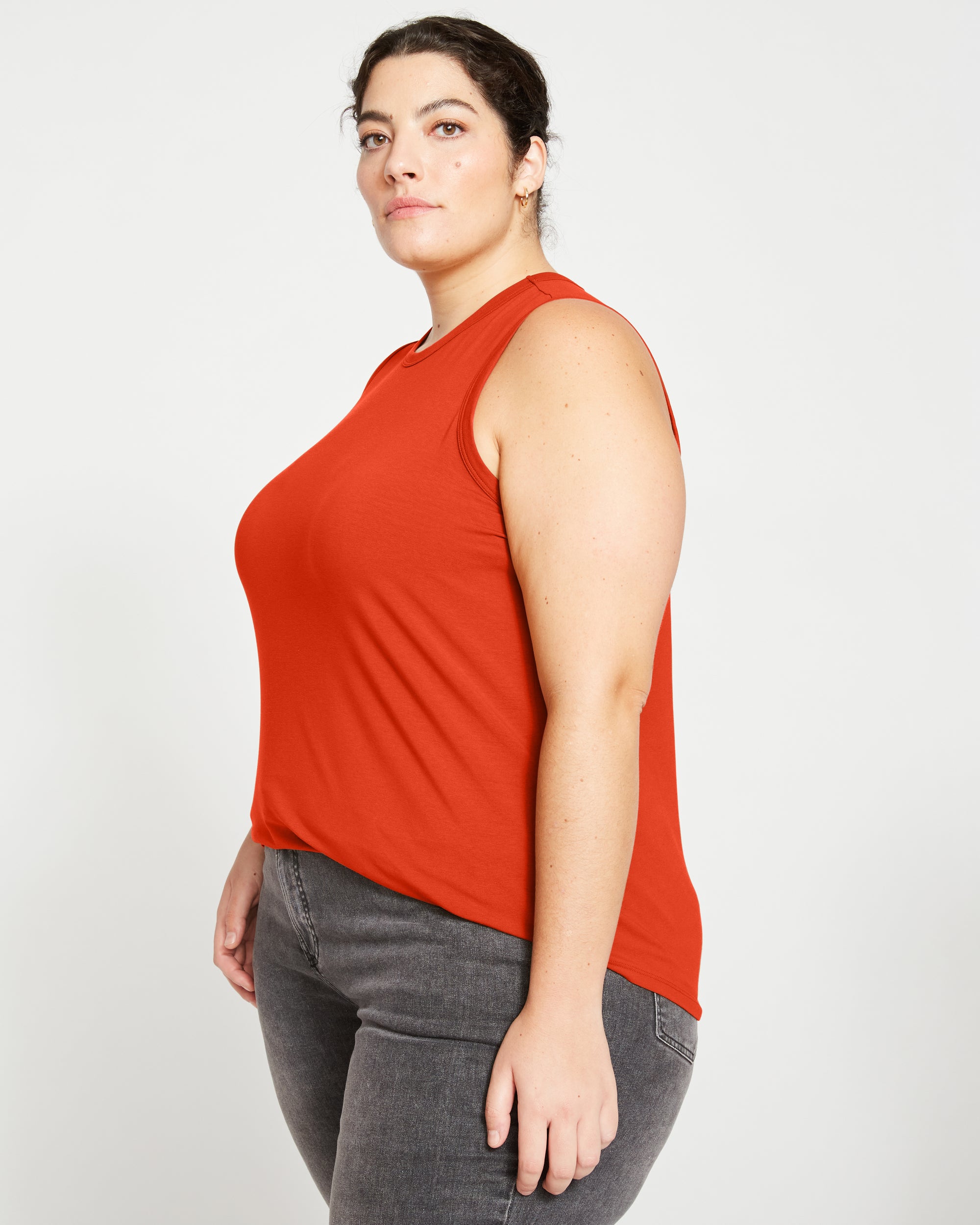 Woman wearing Cai High Neck Tank - Sun Fire from Final Few