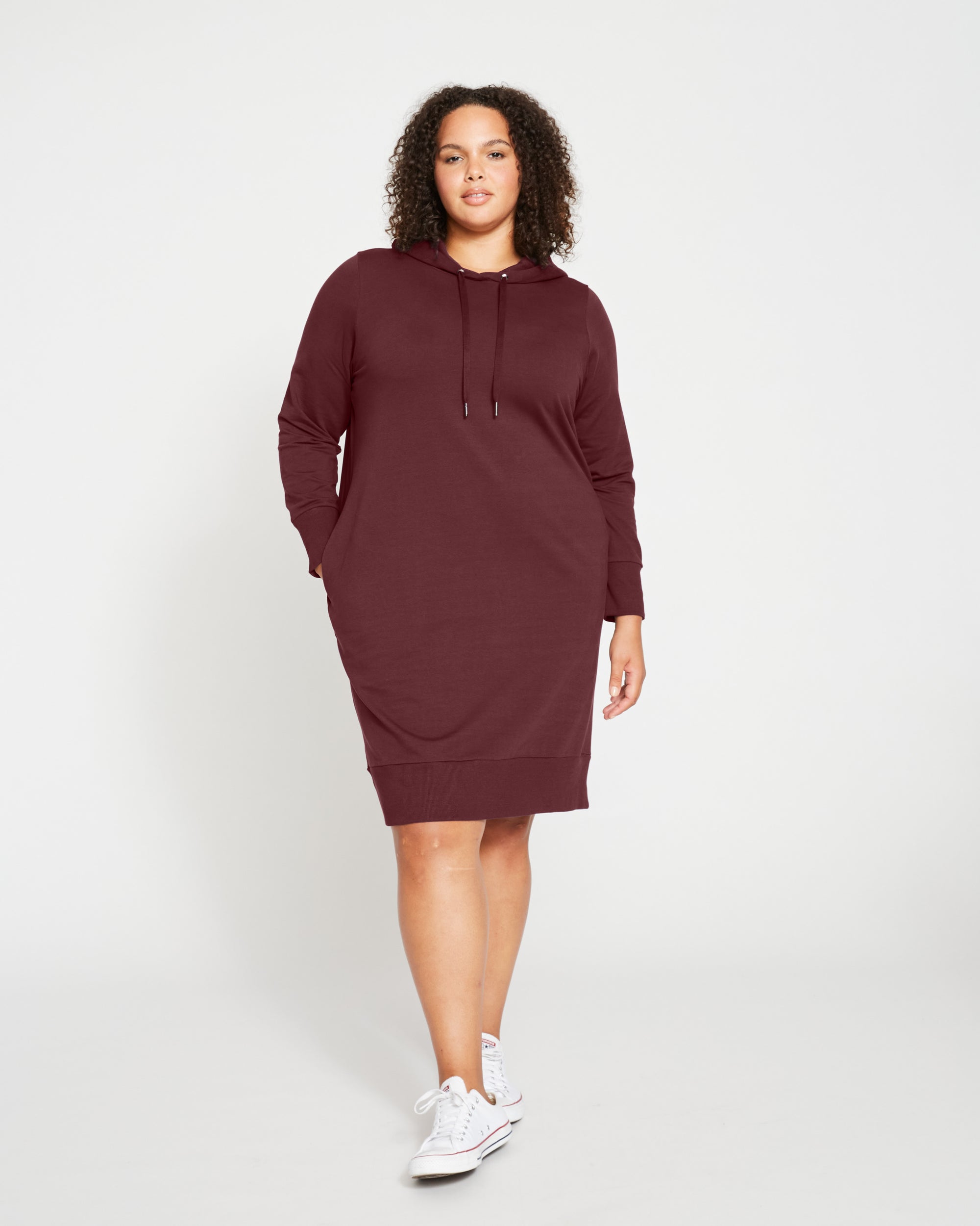 Woman wearing Bree Hooded Sweatshirt Dress - Black Cherry from Universal Standard