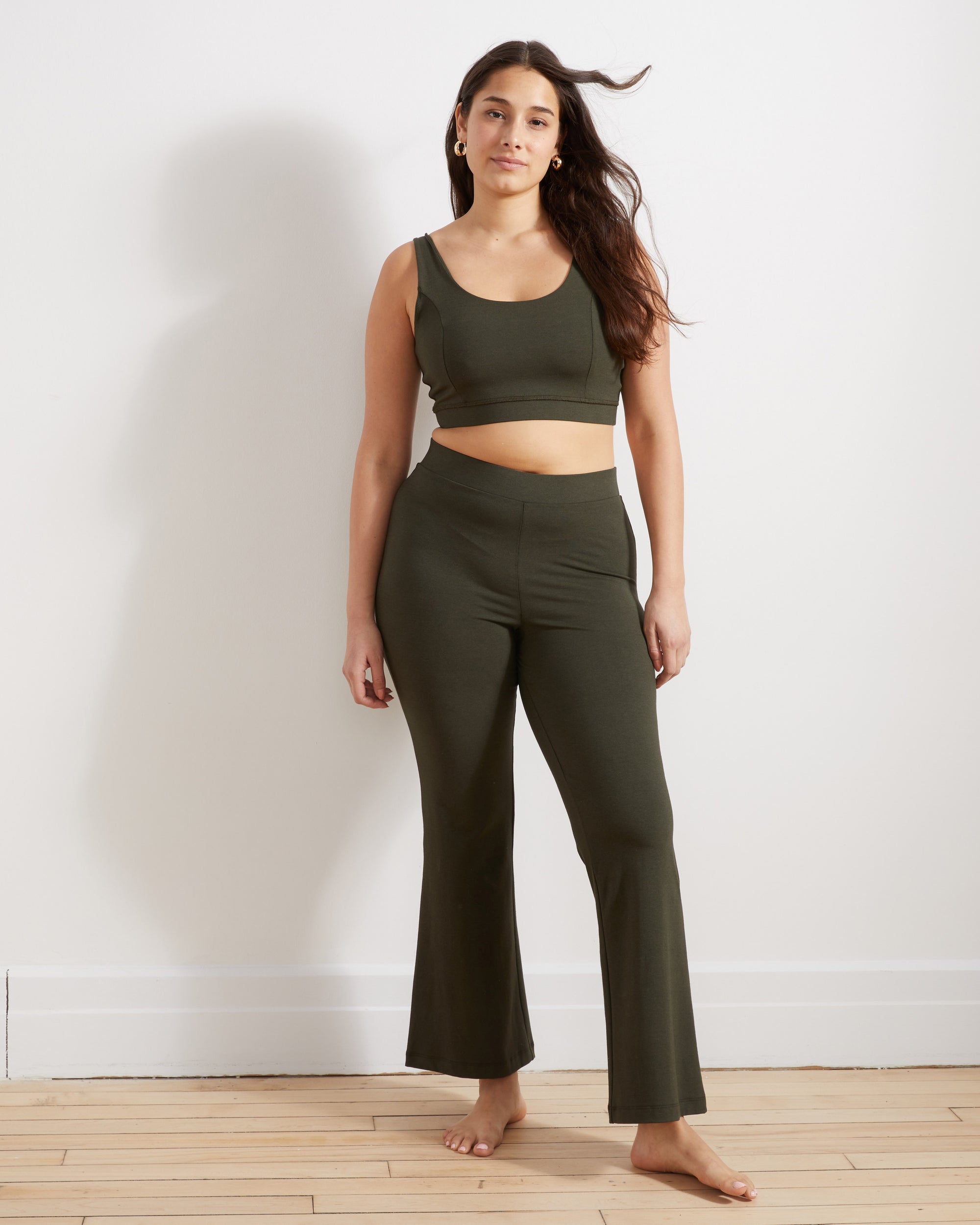 Woman wearing Roya Bootcut Legging - Nori from Universal Standard
