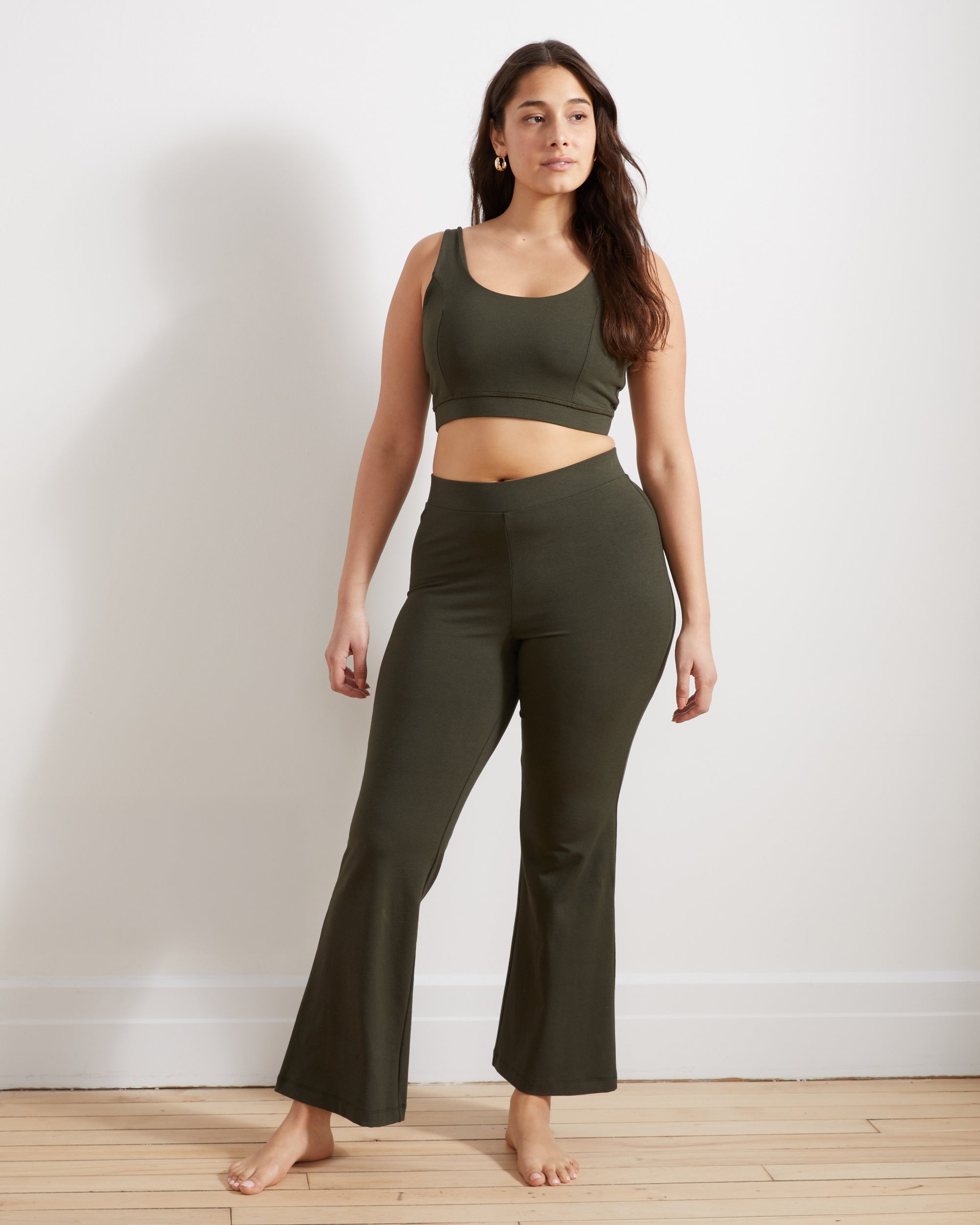 Woman wearing Roya Bootcut Legging - Nori from Universal Standard