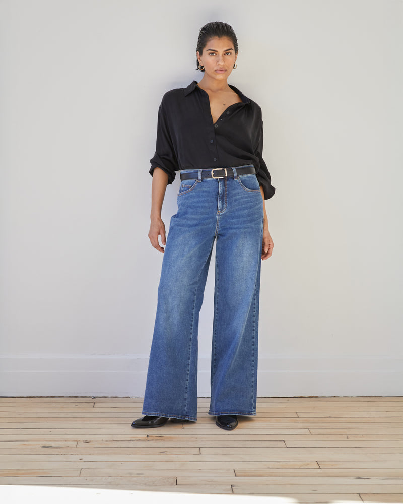 Woman wearing Cooling Stretch Cupro Artist Shirt - Black from Universal Standard