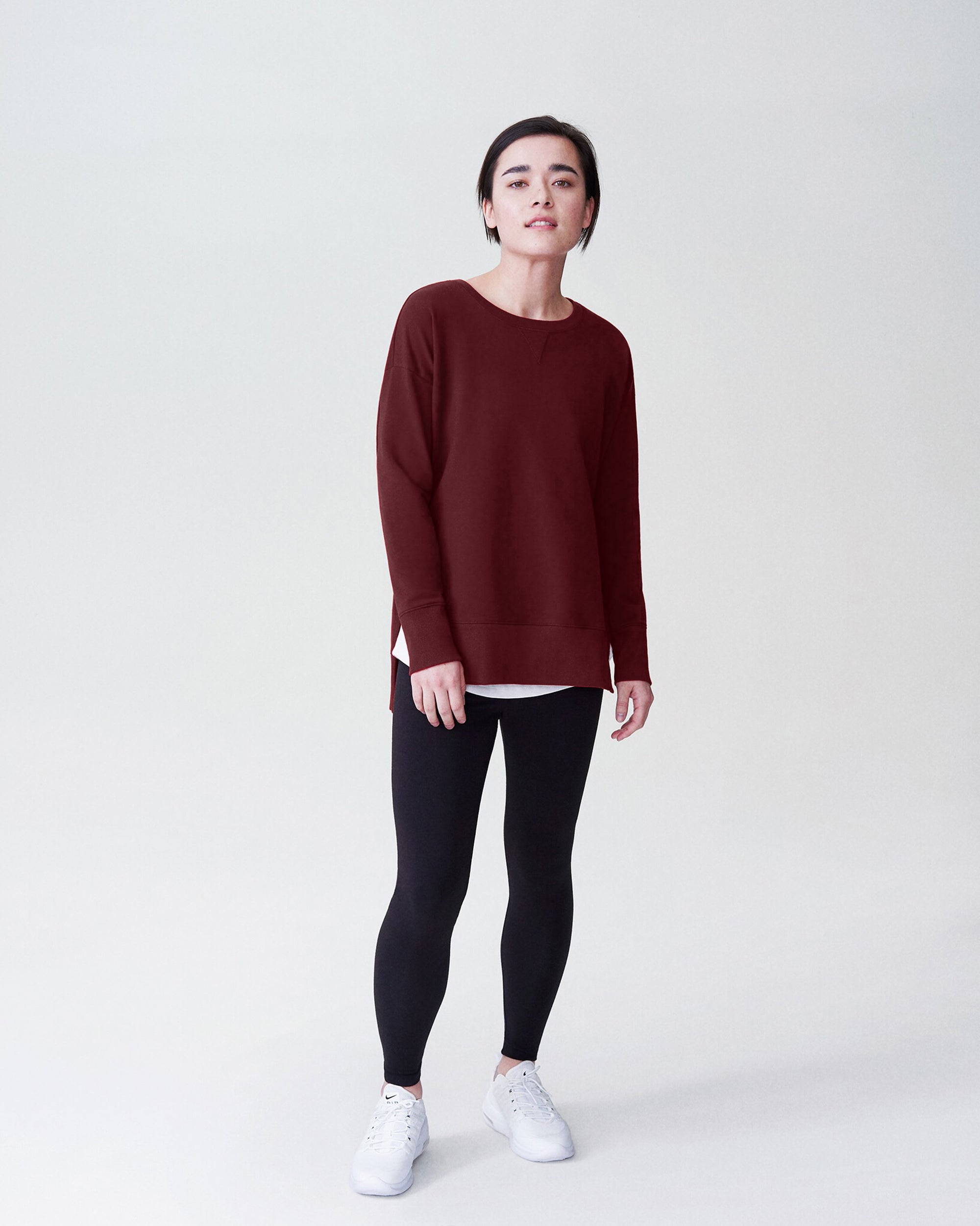 Woman wearing Fiona Side Slit Sweatshirt - Black Cherry from Universal Standard