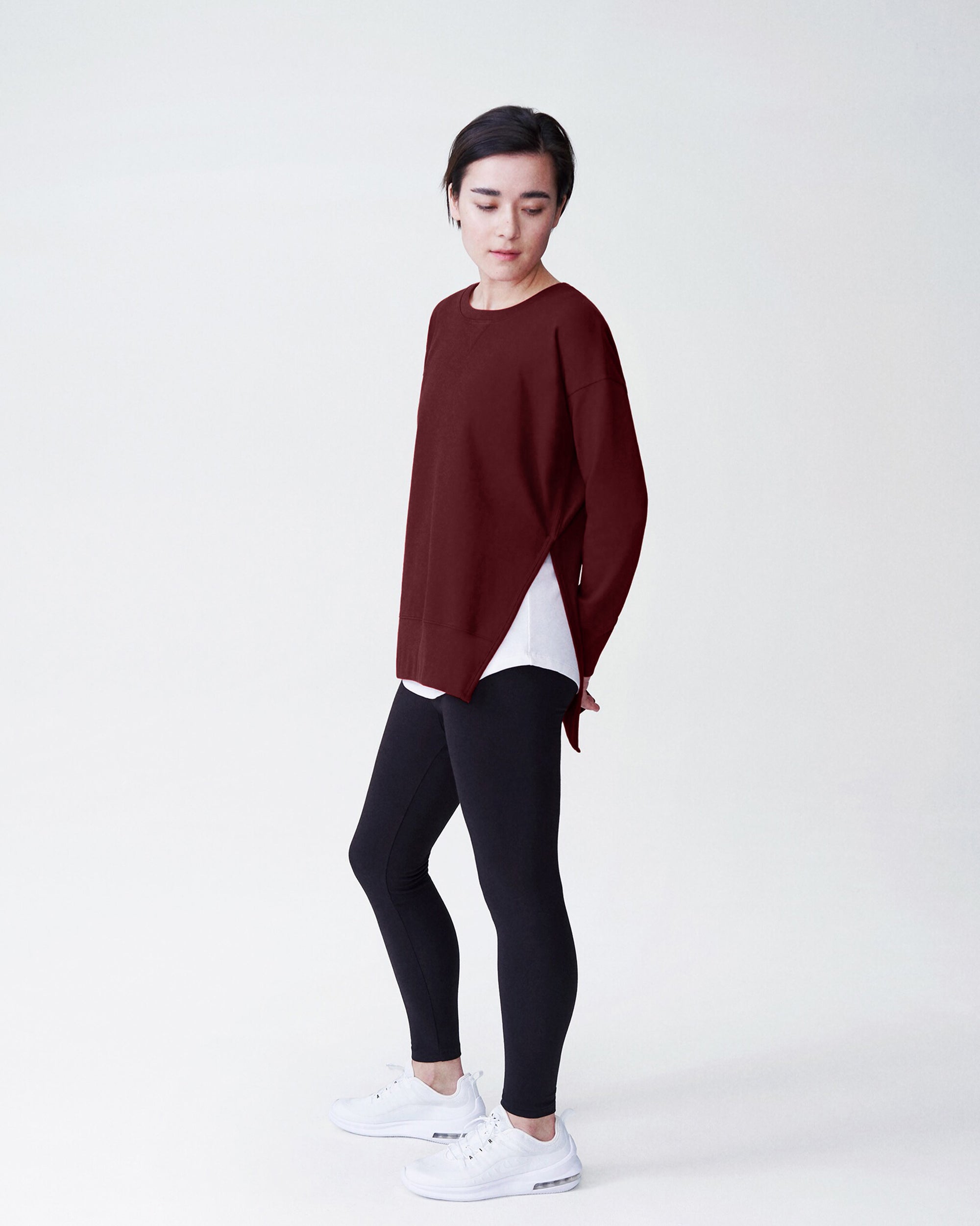 Woman wearing Fiona Side Slit Sweatshirt - Black Cherry from Universal Standard