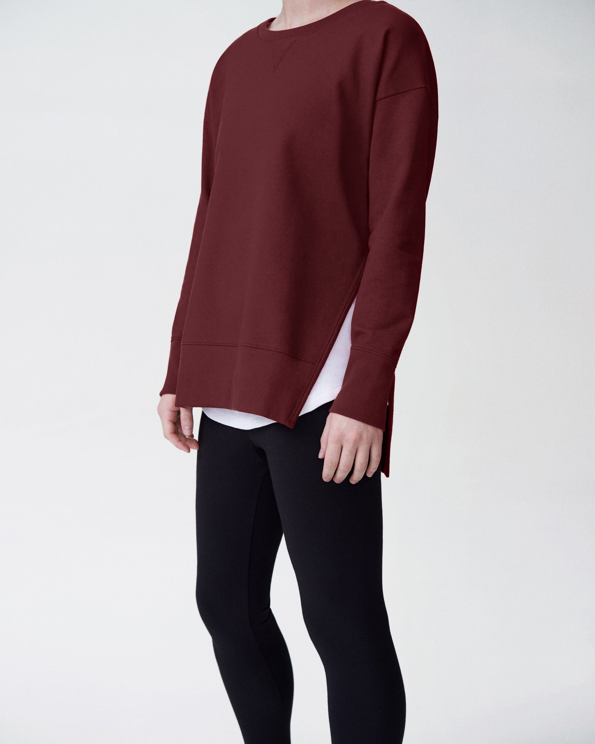 Woman wearing Fiona Side Slit Sweatshirt - Black Cherry from Universal Standard