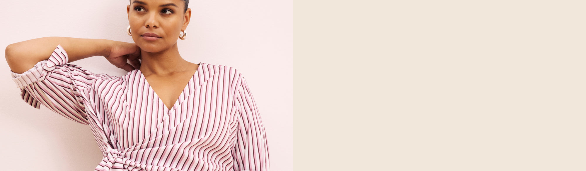 Model wearing styles from the Fit Liberty Tops collection