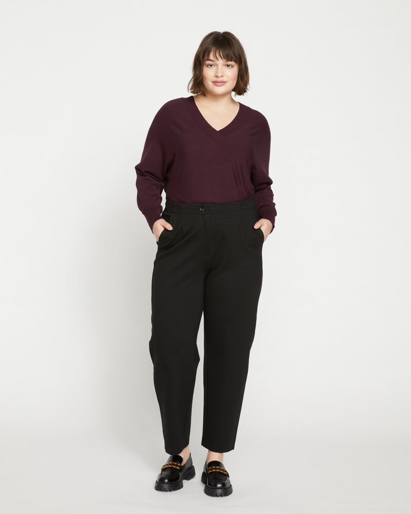 Woman wearing Audrey Tailored Ponte Pants - Black from Universal Standard