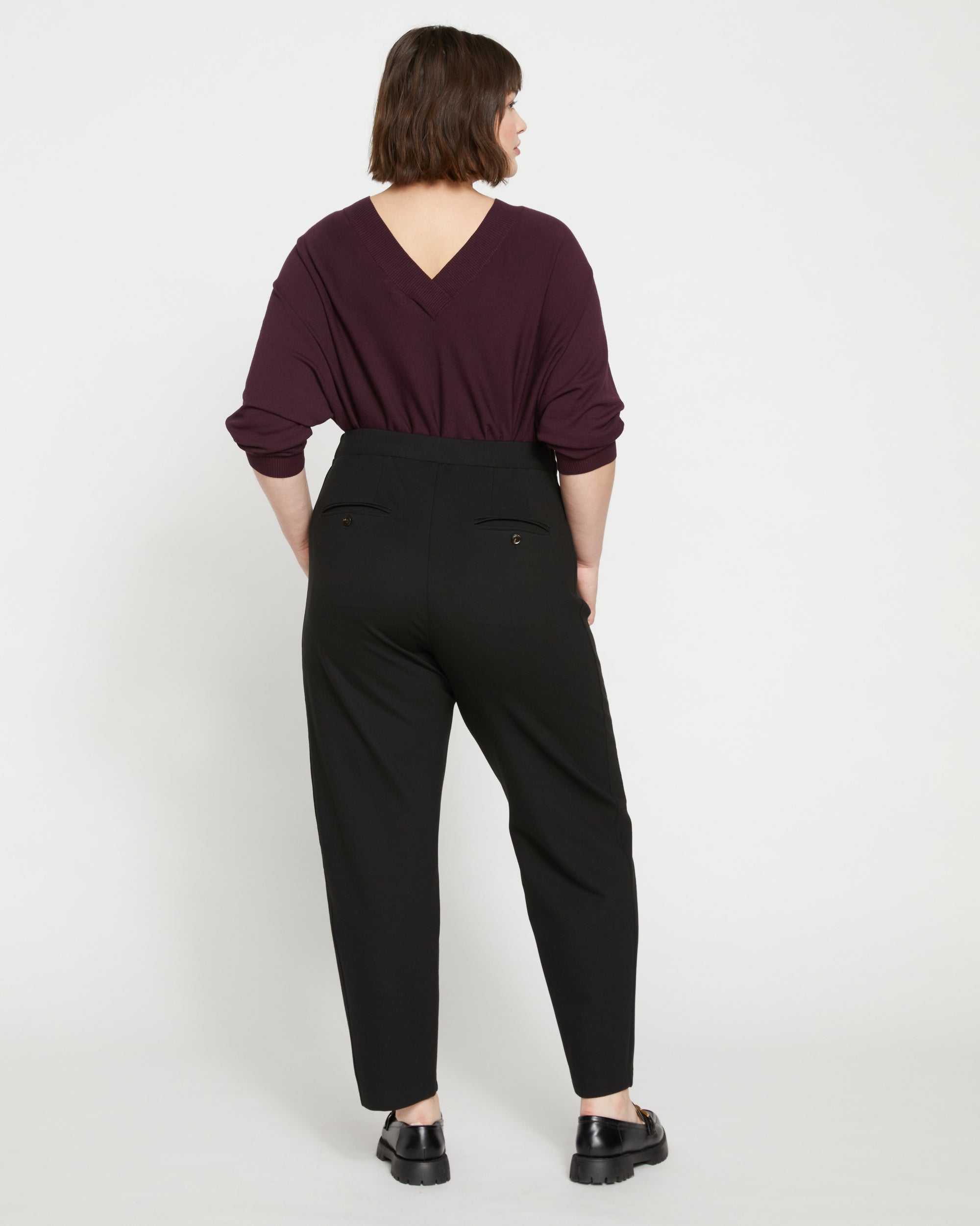 Woman wearing Audrey Tailored Ponte Pants - Black from Universal Standard