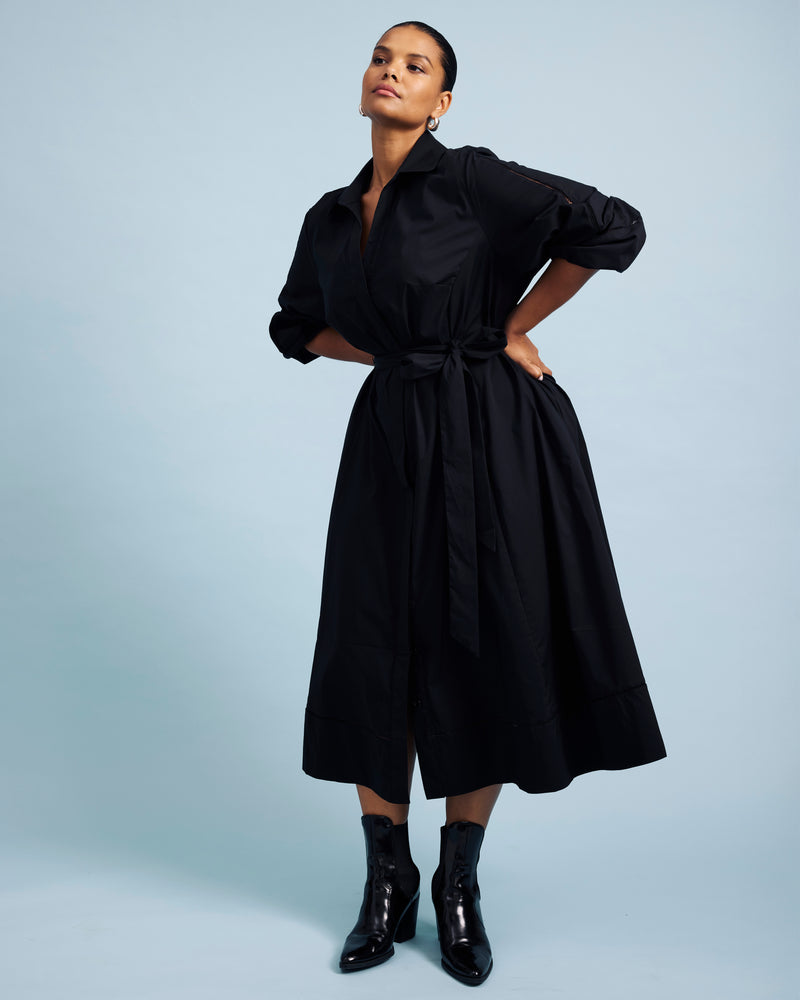 Woman wearing Yuli Stretch Poplin Shirtdress - Black from Universal Standard