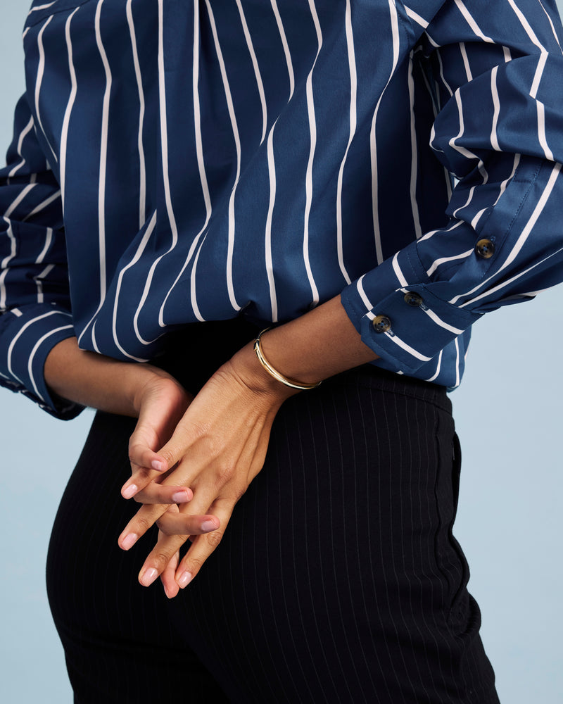 Woman wearing Elbe Stretch Poplin Shirt Classic Fit - Ensign Blue/White Stripe from Universal Standard