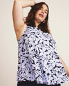 Woman wearing Heatwave Divine Jersey Flared Tank - Petal Palette Print in Jacaranda from Overstock Sale