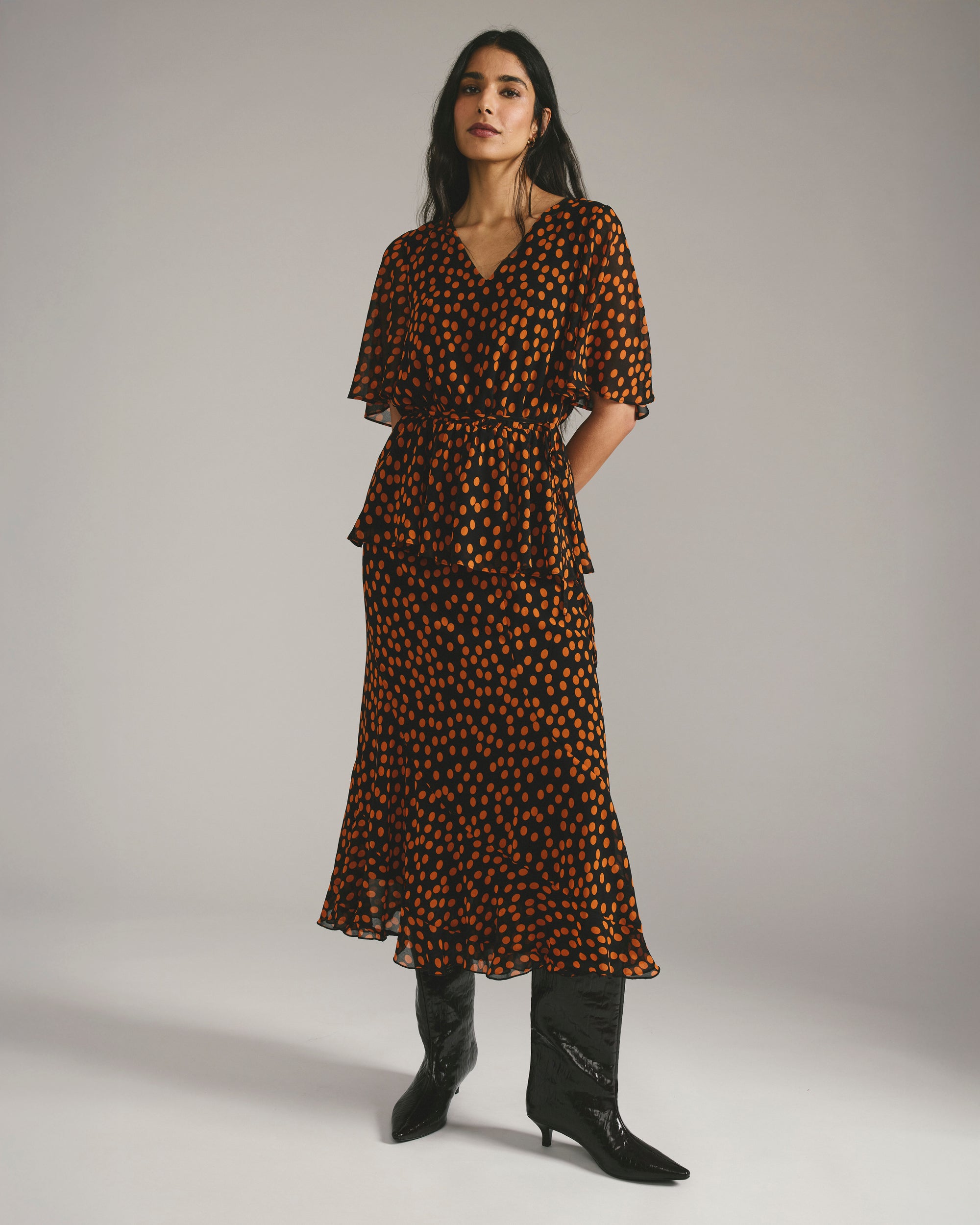 Milou V-Neck Peplum Chiffon Top - Black/Orange Dot Print