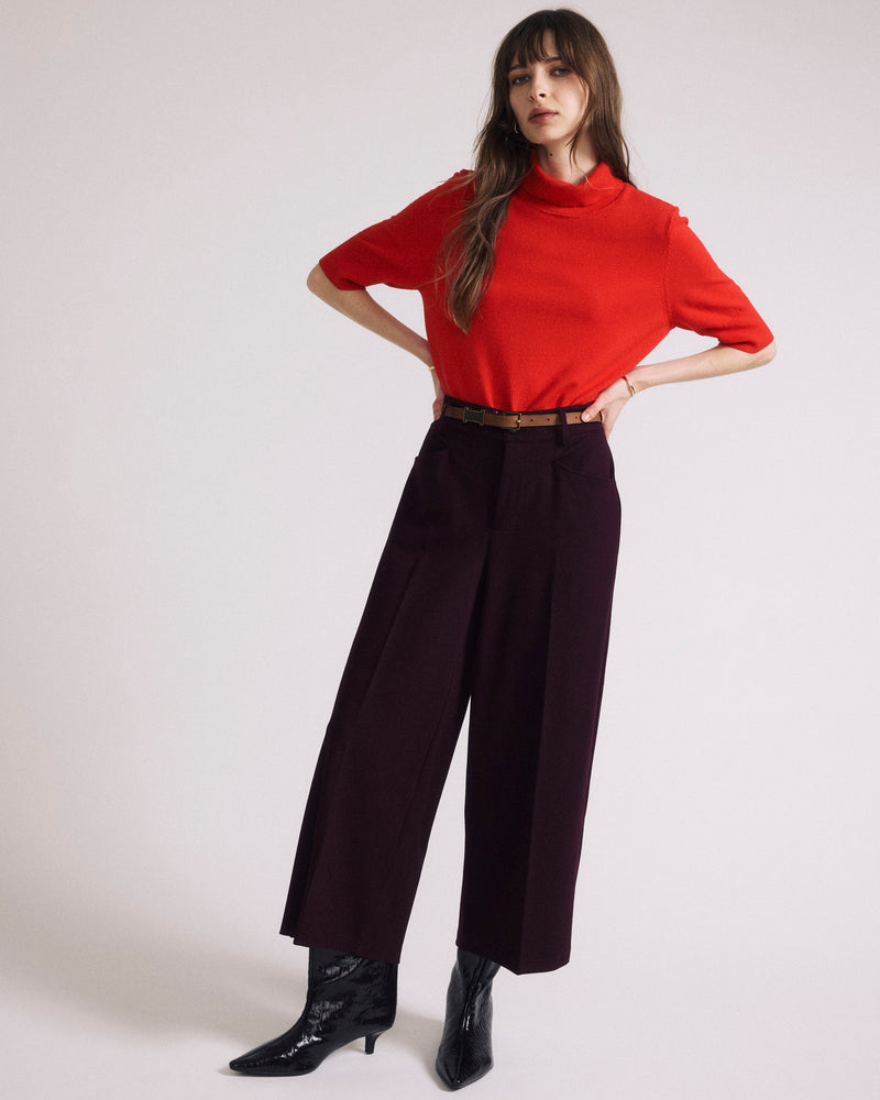 Woman wearing Cropped Wide Leg Ponte Pants - Black Cherry from Universal Standard