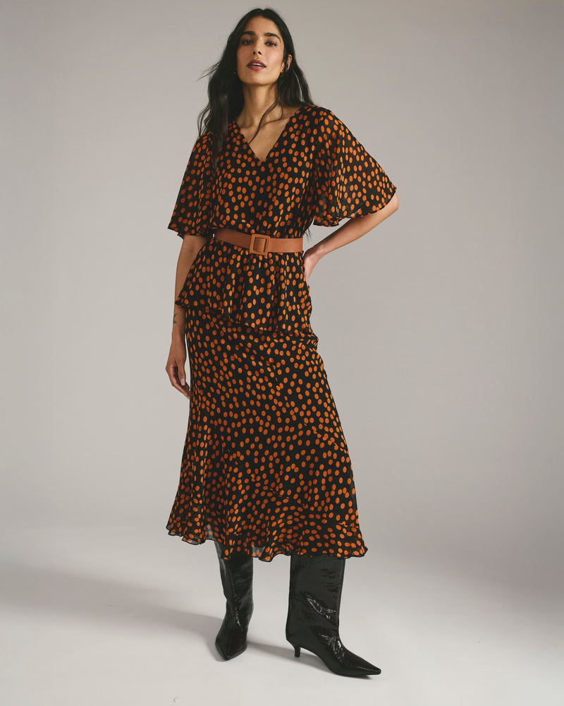 Milou V-Neck Peplum Chiffon Top - Black/Orange Dot Print