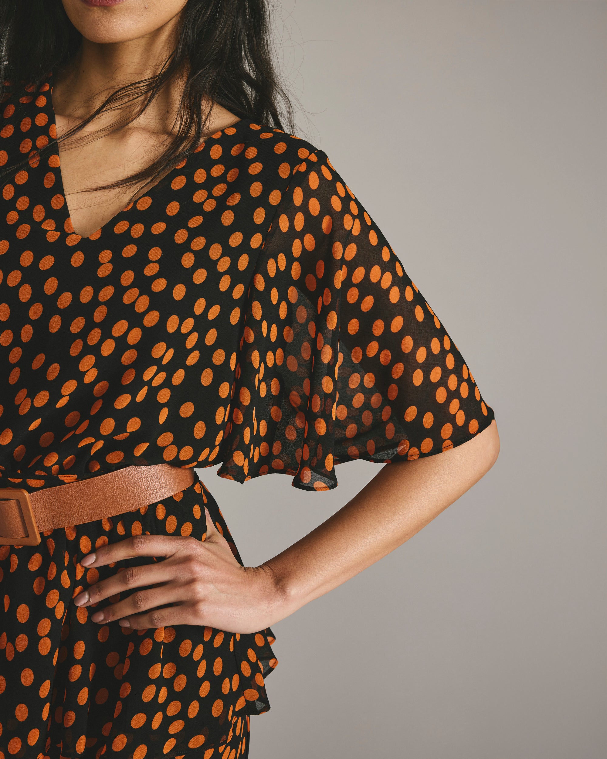 Milou V-Neck Peplum Chiffon Top - Black/Orange Dot Print