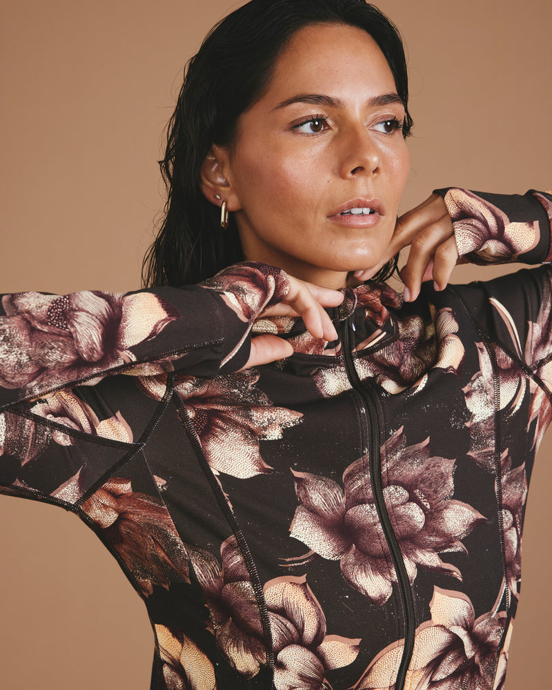 Woman wearing Next-to-Naked Hooded Zip Jacket - Lotus Print from Universal Standard