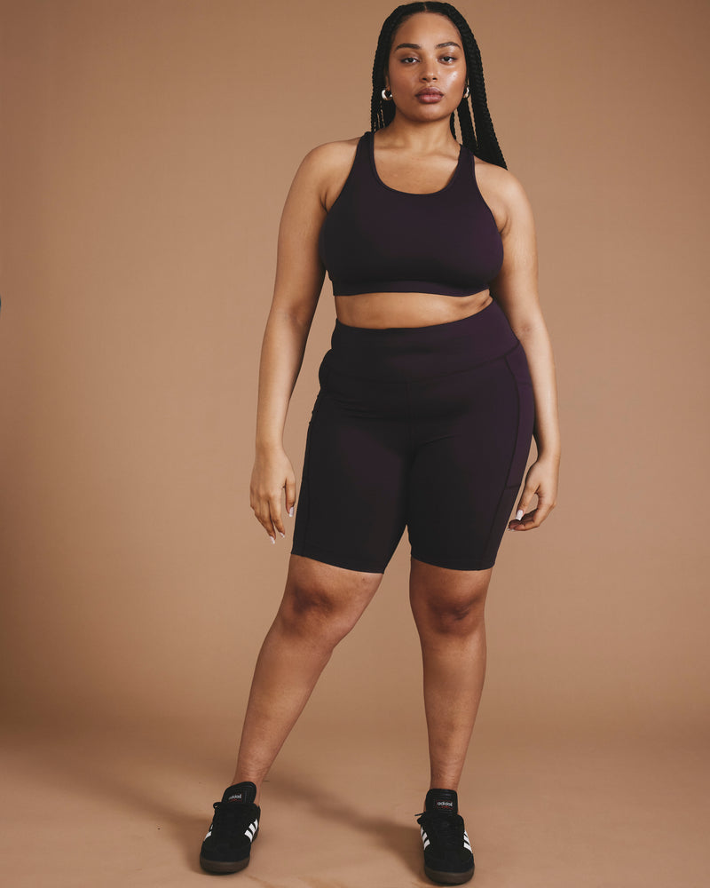 Woman wearing Next-to-Naked Bike Shorts - Purple Jewel from Universal Standard