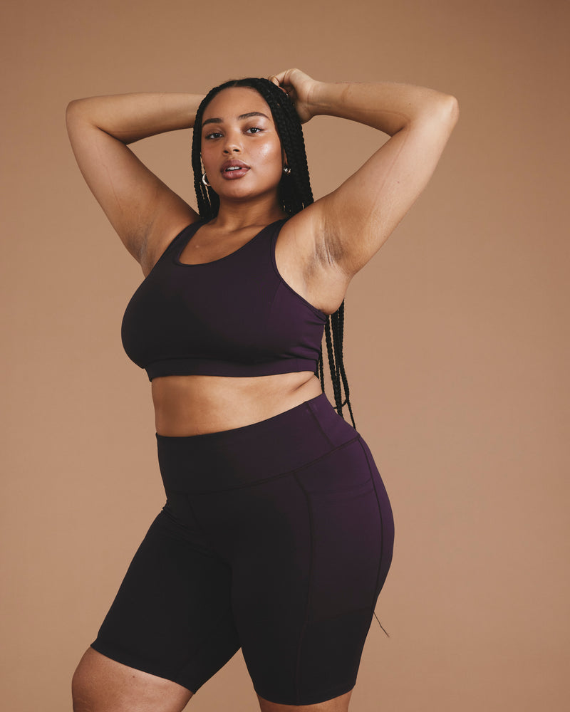 Woman wearing Next-to-Naked Bike Shorts - Purple Jewel from Universal Standard