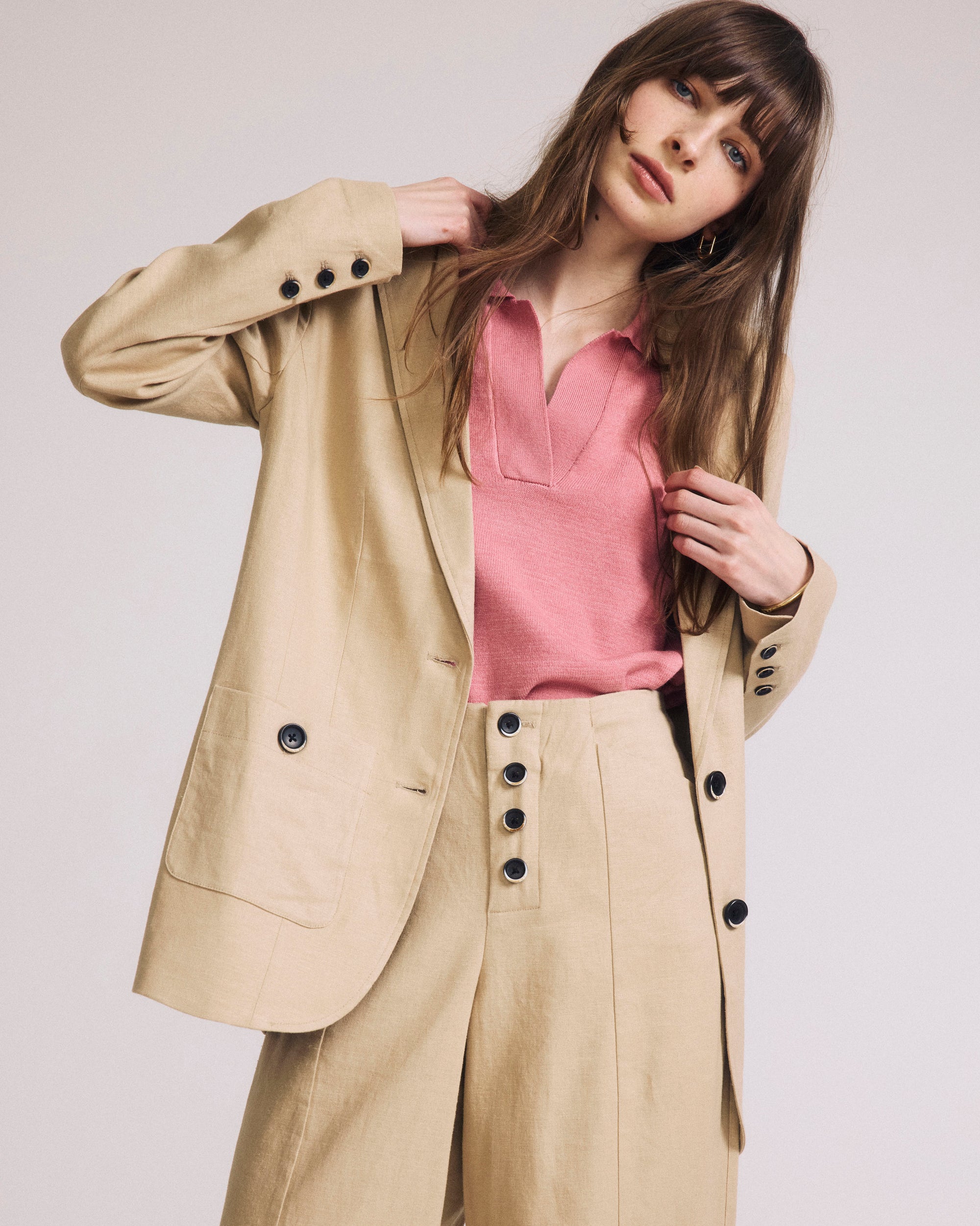 Woman wearing Coastal Linen Pants - Danish Coffee from Universal Standard