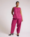 Woman wearing Lou Barrel Leg Linen Pants - Hyper Pink from Universal Standard