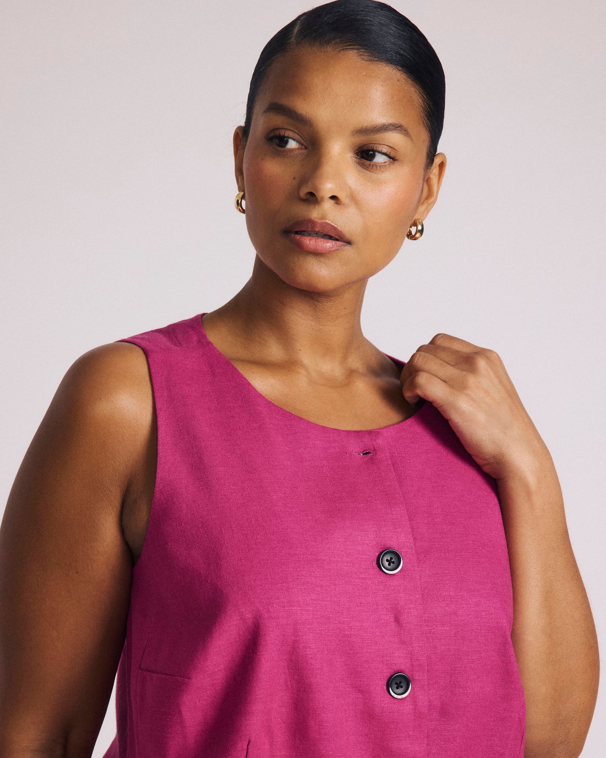Woman wearing Tamsin Stretch Linen Vest - Hyper Pink from Universal Standard