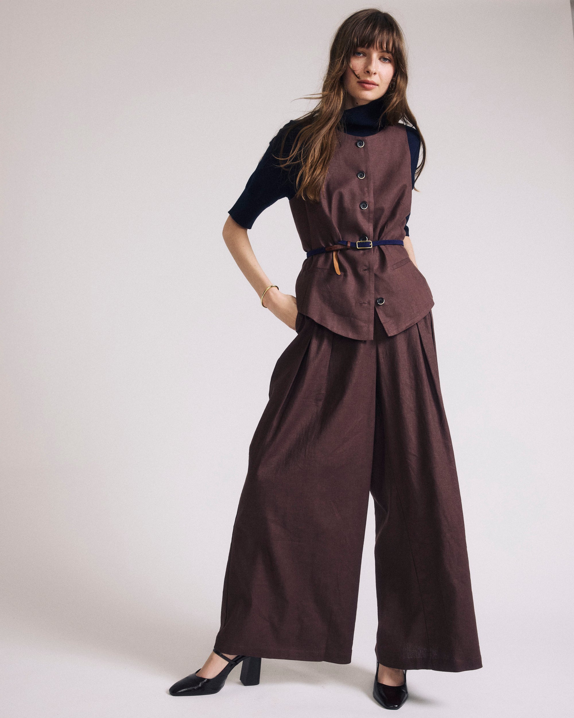 Woman wearing Tamsin Stretch Linen Vest - Sophisticated Brown from Universal Standard