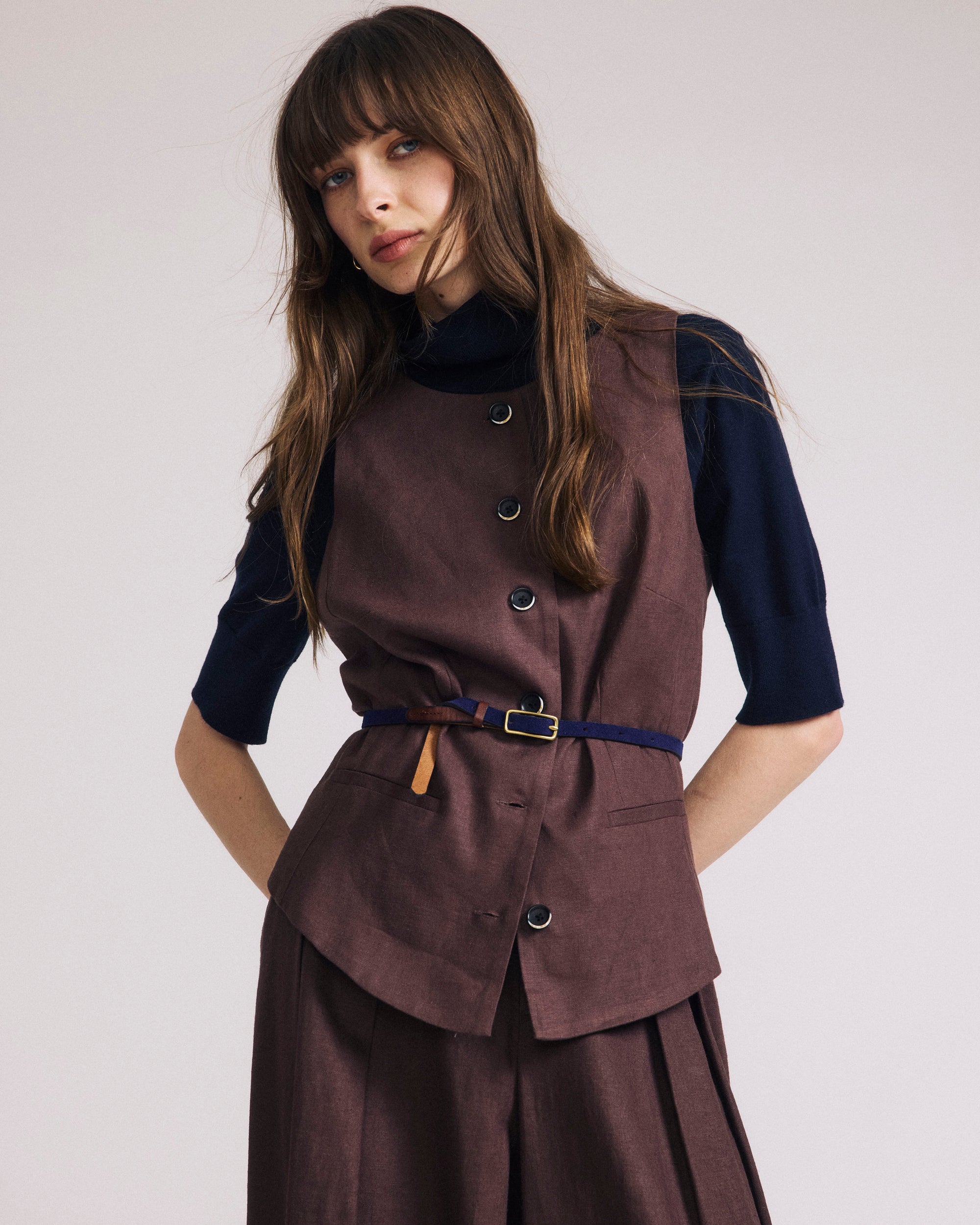 Woman wearing Tamsin Stretch Linen Vest - Sophisticated Brown from Universal Standard