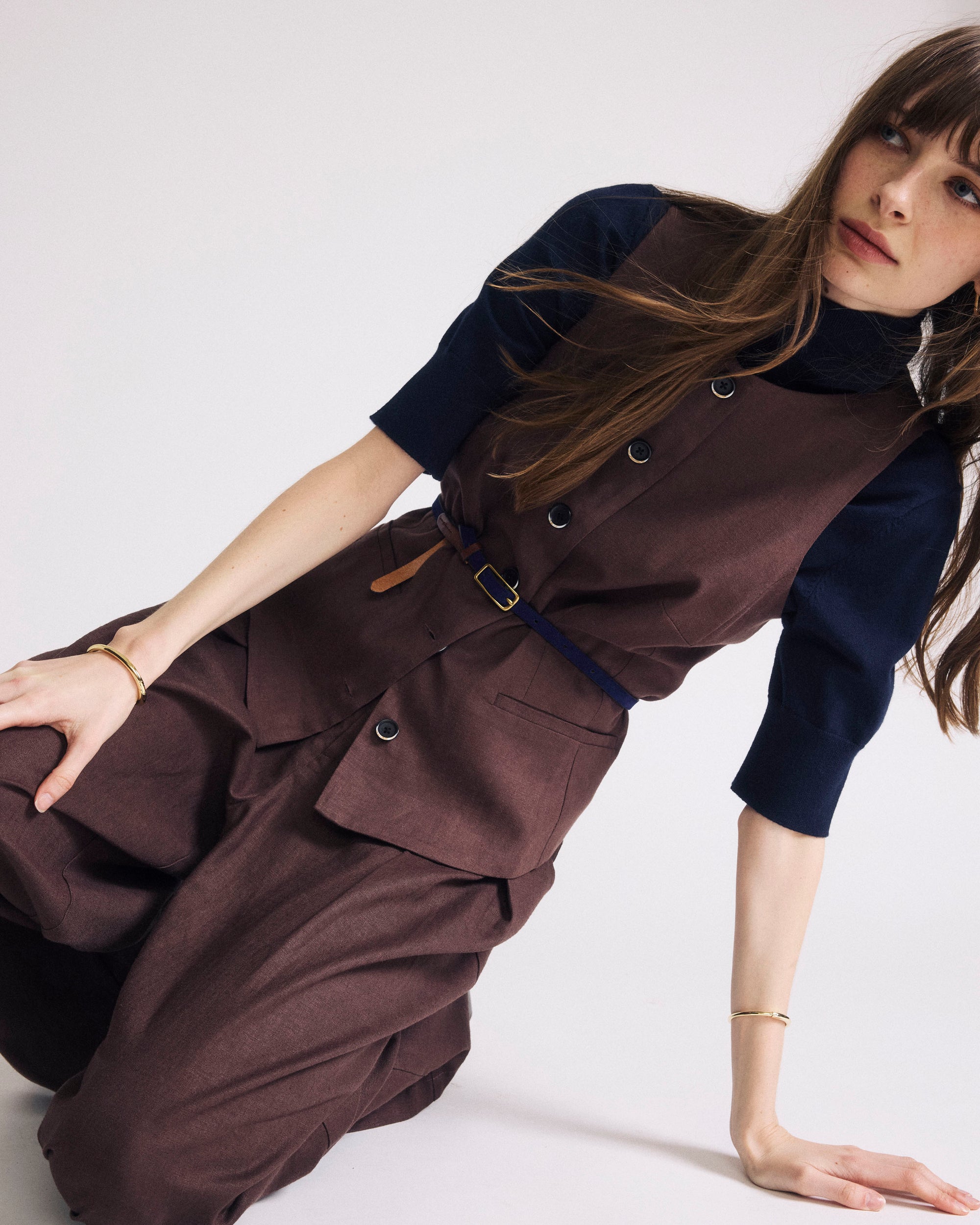Woman wearing Tamsin Stretch Linen Vest - Sophisticated Brown from Universal Standard