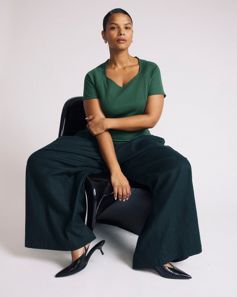 Woman wearing Carey Ribbed Top - Green Park from Universal Standard