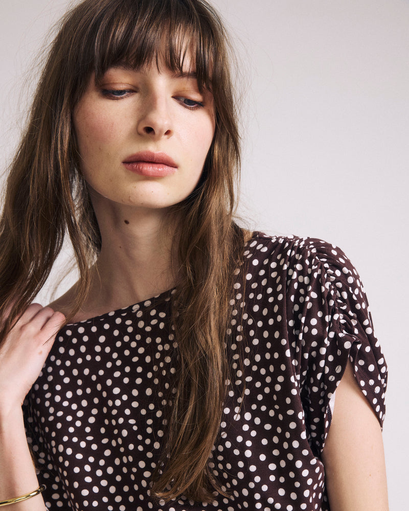Woman wearing Helena Divine Jersey Gathered Tee - Brown/White Dot Print from Universal Standard