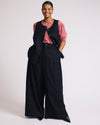 Woman wearing Palais Stretch Linen Wide Leg Pant - Black from Universal Standard