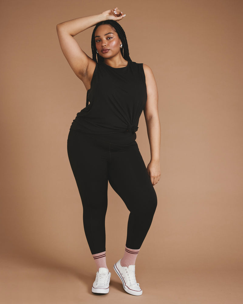 Woman wearing Next-to-Naked Cropped Pocket Legging - Deep Brown from Universal Standard