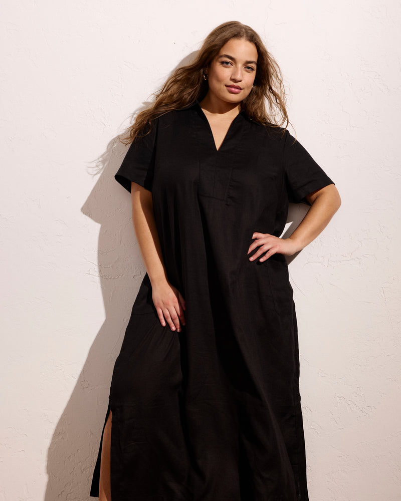 Woman wearing Padma Polo Neck Linen Dress - Black from Universal Standard