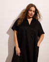 Woman wearing Padma Polo Neck Linen Dress - Black from Universal Standard