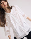 Woman wearing Dora Cotton Poplin Blouse - White from Universal Standard
