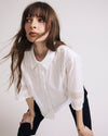 Woman wearing Dora Cotton Poplin Blouse - White from Universal Standard