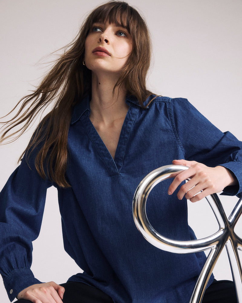 Woman wearing Maisie Cotton Chambray Blouse - Vintage Indigo from Universal Standard