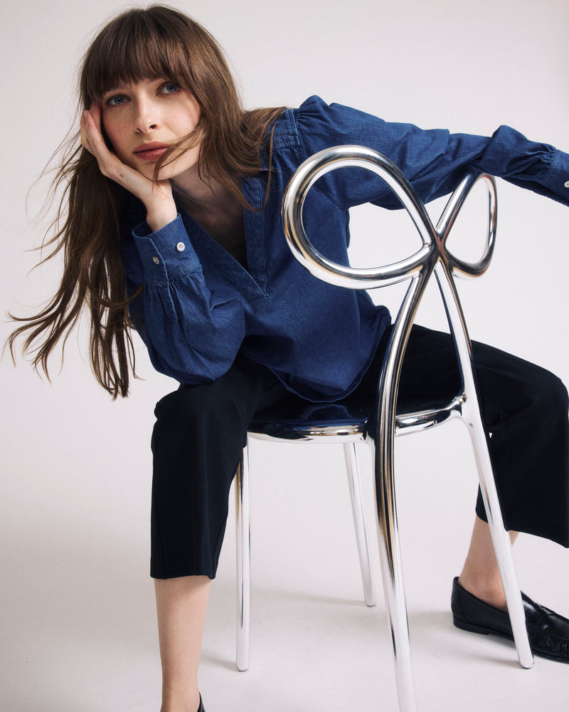 Woman wearing Maisie Cotton Chambray Blouse - Vintage Indigo from Universal Standard