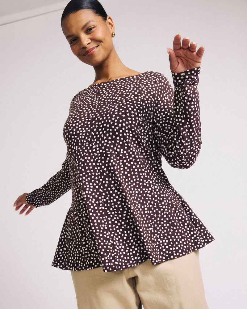 Woman wearing Cassandra Divine Jersey Top - Brown/White Dot Print from Universal Standard