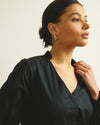 Woman wearing Saint-Honore Poplin Blouse - Black from Universal Standard