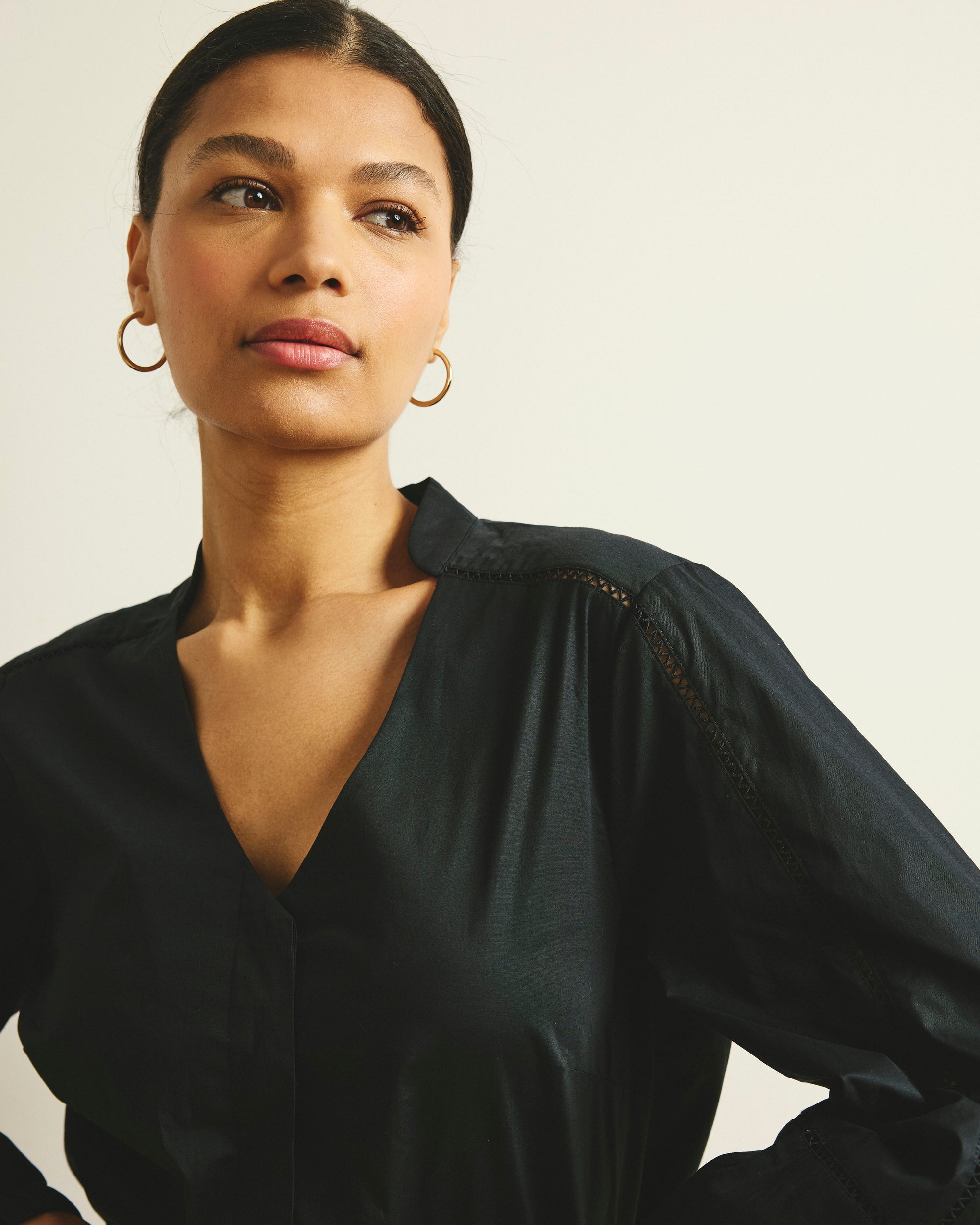 Woman wearing Saint-Honore Poplin Blouse - Black from Universal Standard