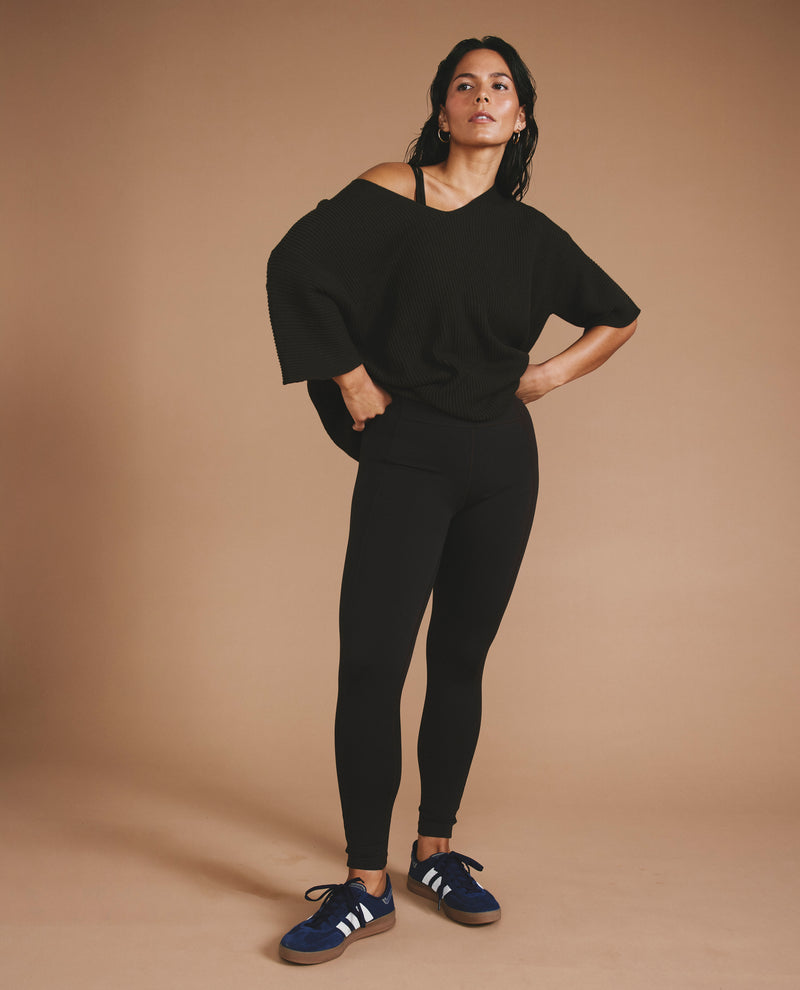 Woman wearing Lotus Sweater - Deep Brown from Universal Standard