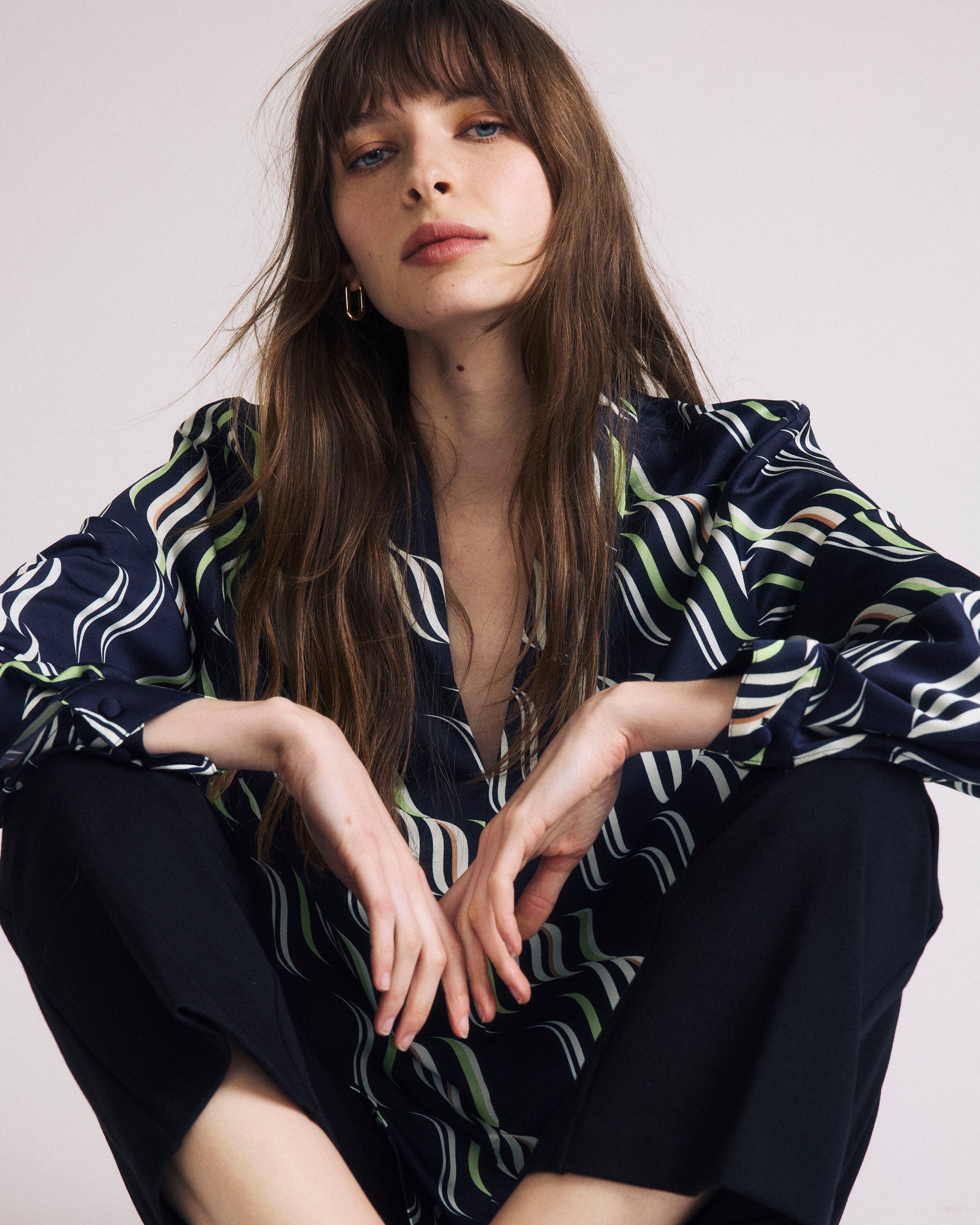 Woman wearing Georgette Satin Cambria Blouse - Paddington Ribbon Print from Universal Standard