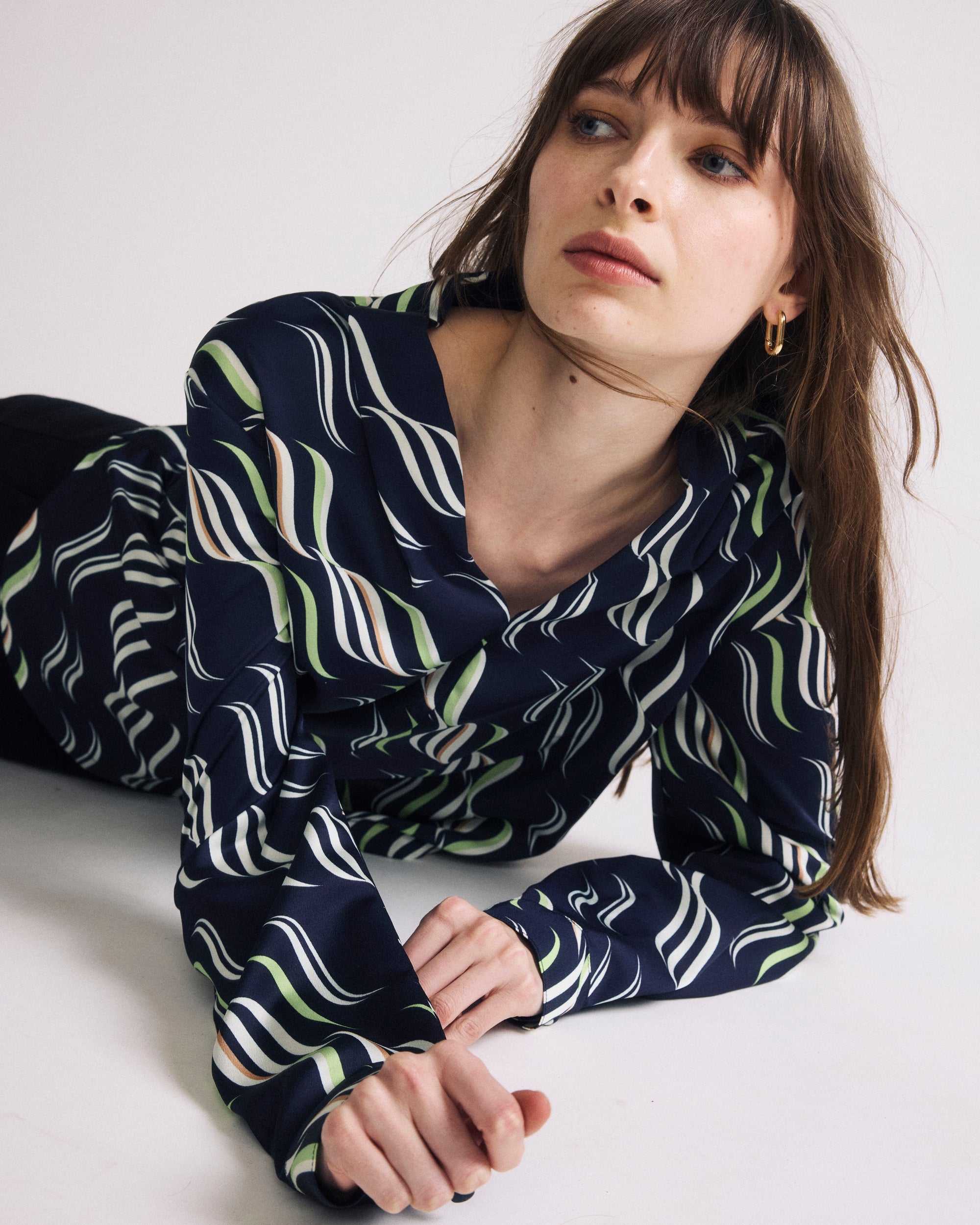 Woman wearing Georgette Satin Cambria Blouse - Paddington Ribbon Print from Universal Standard