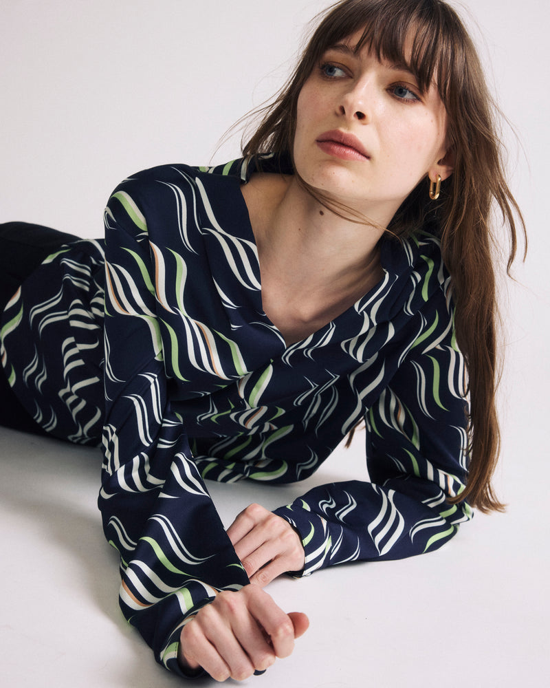 Woman wearing Georgette Satin Cambria Blouse - Paddington Ribbon Print from Universal Standard