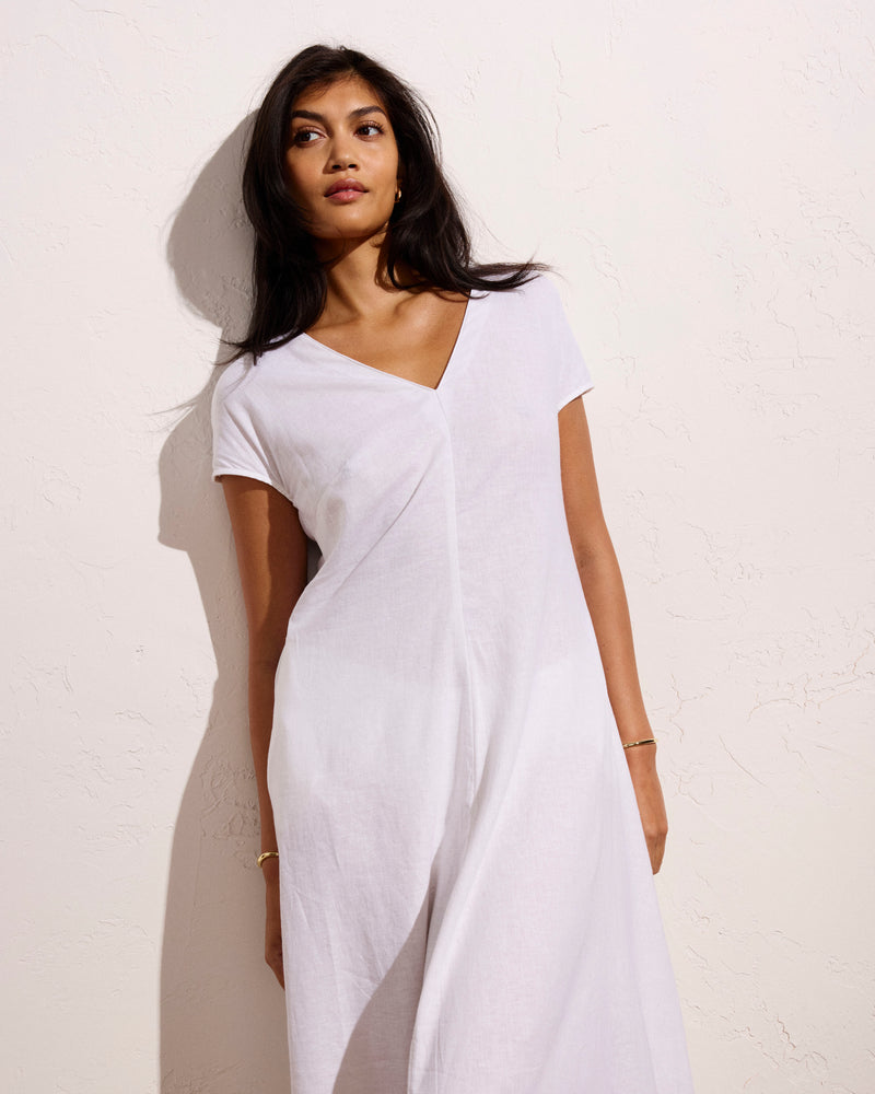 Woman wearing Louvre Bow Back Linen Dress - Bright White from Universal Standard