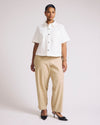 Woman wearing Lou Barrel Leg Linen Pants - Danish Coffee from Universal Standard