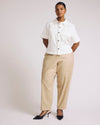 Woman wearing Lou Barrel Leg Linen Pants - Danish Coffee from Universal Standard
