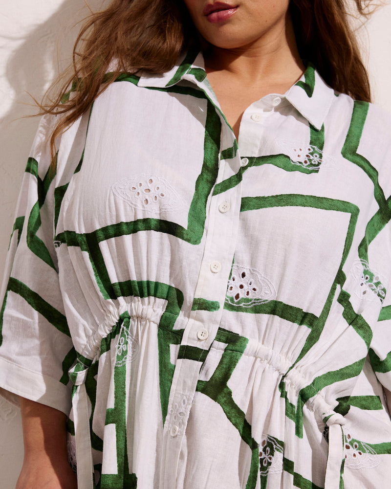 Woman wearing Paros Drawstring Linen Shirtdress - Green Paint Print from Universal Standard