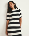 Woman wearing Belle Breton Stripe Jersey Dress - Ecru/Black Rugby Stripe from Universal Standard